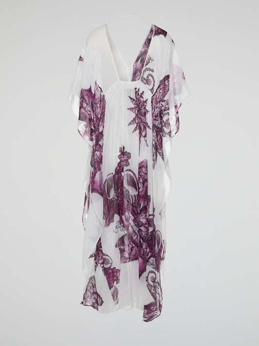 Step into the exotic world of Roberto Cavalli with our stunning Printed Tie-Front Kaftan. This luxurious fashion statement effortlessly combines the vibrant prints and silky textures for a truly mesmerizing beach ensemble. Whether strolling along the coast or lounging poolside, let the timeless elegance of this kaftan transport you to a world of unparalleled glamor.