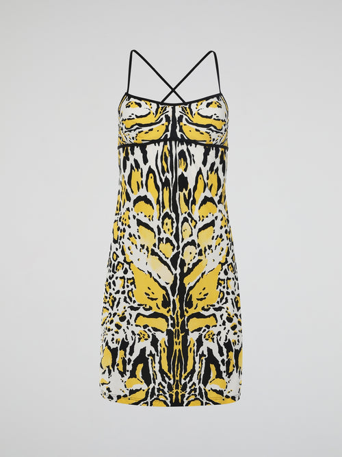 Introducing the Yellow Printed Strap Dress by Roberto Cavalli, where elegance meets vibrant playfulness. This enchanting masterpiece features a luxurious silky fabric adorned with a captivating pattern of intricate yellow hues, perfect for making a statement at any event. With its flattering silhouette and delicate straps, this dress effortlessly embodies the essence of modern glamour, promising to leave a lasting impression wherever you go.