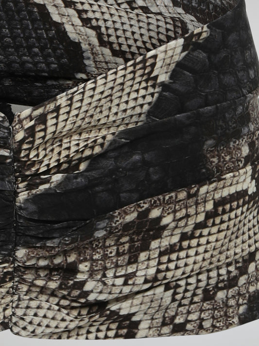 Add a touch of fierce elegance to your outfits with the mesmerizing Snake Print Belt from Roberto Cavalli. Crafted with meticulous attention to detail, this accessory combines edginess and sophistication effortlessly. Let the hypnotic pattern wrap around your waist, instantly transforming any ensemble into a show-stopping masterpiece.