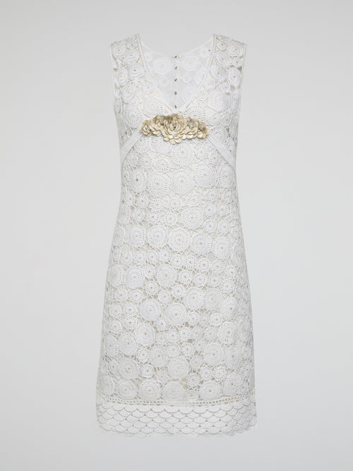 Step into the world of exquisite elegance with this captivating White Crochet Dress by Roberto Cavalli. Crafted with meticulous attention to detail, this dress channels the essence of femininity, showcasing delicate crochet patterns that gracefully embrace your silhouette. Whether you're attending a garden soiree or a beachfront dinner, this dress effortlessly combines timeless charm with modern flair, making you the epitome of effortless beauty.