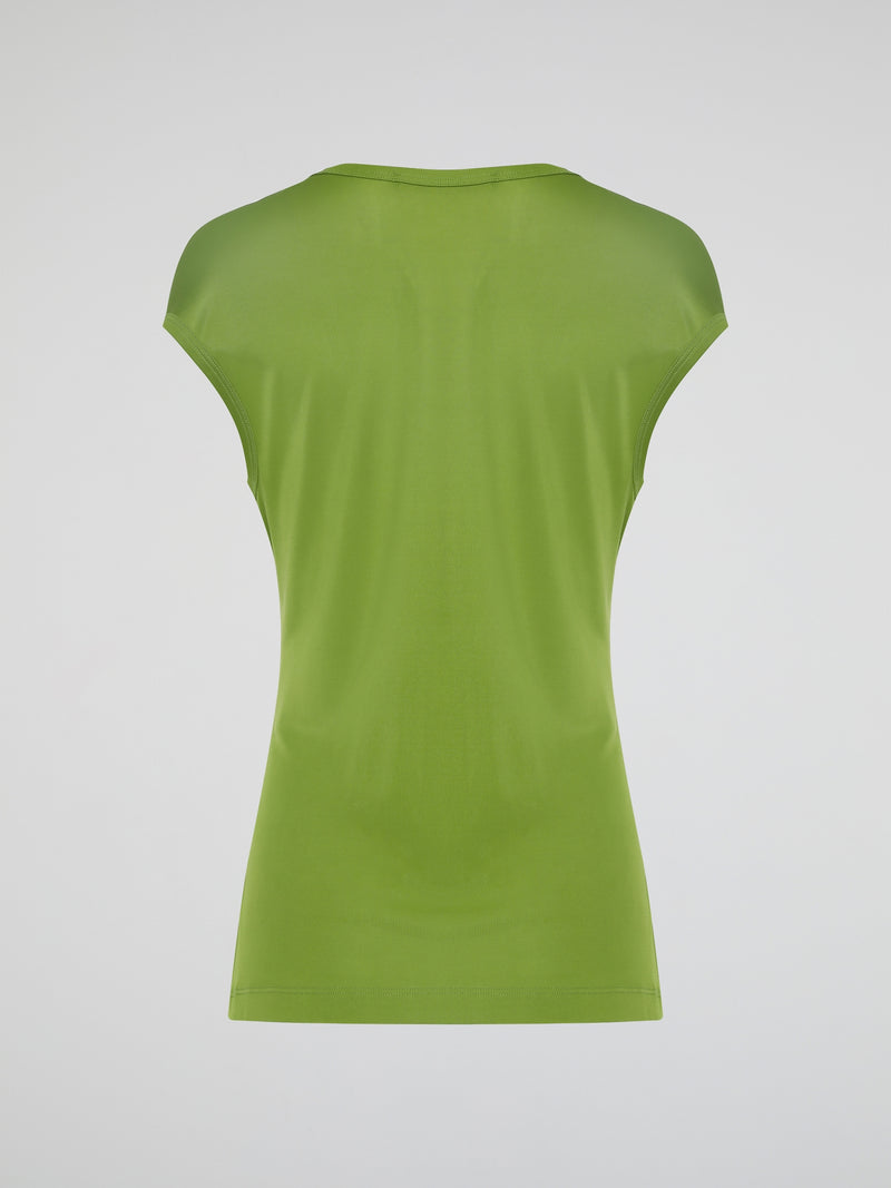 Introducing the Green Scoop Neck Top by Roberto Cavalli, where elegance meets sustainability! Crafted from luxurious eco-friendly materials, this chic piece boasts a flattering scoop neckline and a vibrant green hue that radiates freshness and life. Feel confident and fashion-forward, knowing that this Roberto Cavalli creation not only enhances your style, but also supports a greener future.