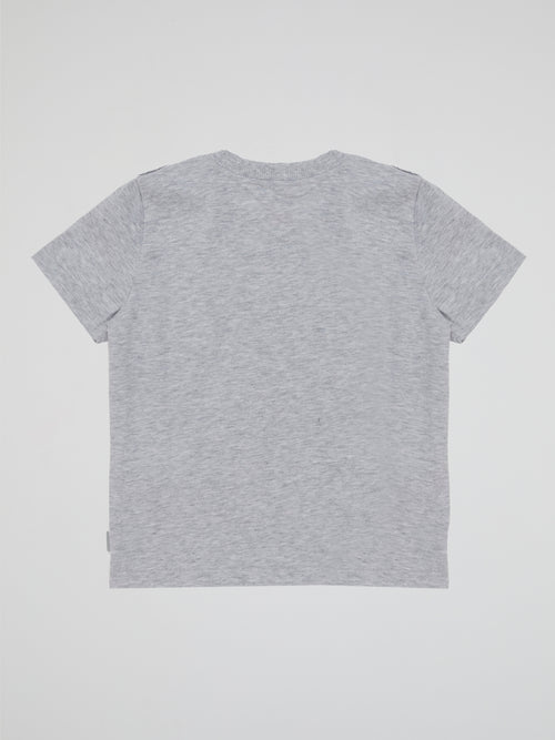 Introducing the Grey Donald Duck T-Shirt, a delightful wardrobe staple that will make your little one quack with joy! Crafted with soft, breathable fabric, this adorable tee features the iconic Donald Duck adorned in charming shades of gray, adding a playful twist to any outfit. Let your child embrace their inner Disney enthusiast and rock this Iceberg gray tee to create unforgettable memories and a style that's truly 