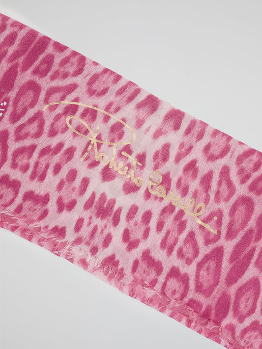 Wrap yourself in the wild elegance of this Pink Animal Print Scarf by Roberto Cavalli. The luxurious blend of soft fabric showcases a mesmerizing array of rosy hues, adorned with a fierce and playful animal motif. With each drape, let this statement accessory unleash your inner fashion safari, captivating attention wherever you go.