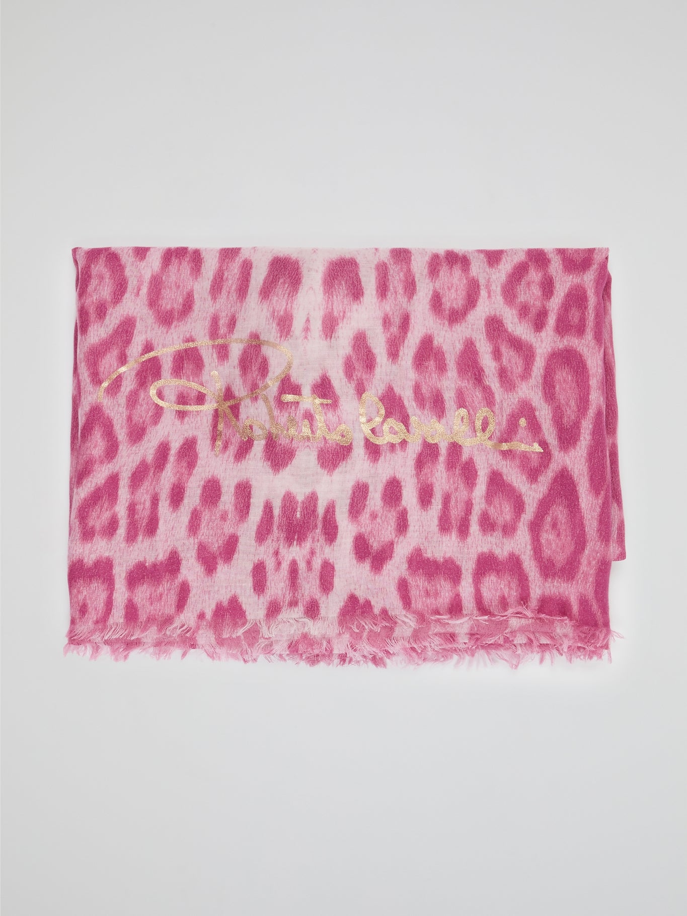 Wrap yourself in the wild elegance of this Pink Animal Print Scarf by Roberto Cavalli. The luxurious blend of soft fabric showcases a mesmerizing array of rosy hues, adorned with a fierce and playful animal motif. With each drape, let this statement accessory unleash your inner fashion safari, captivating attention wherever you go.
