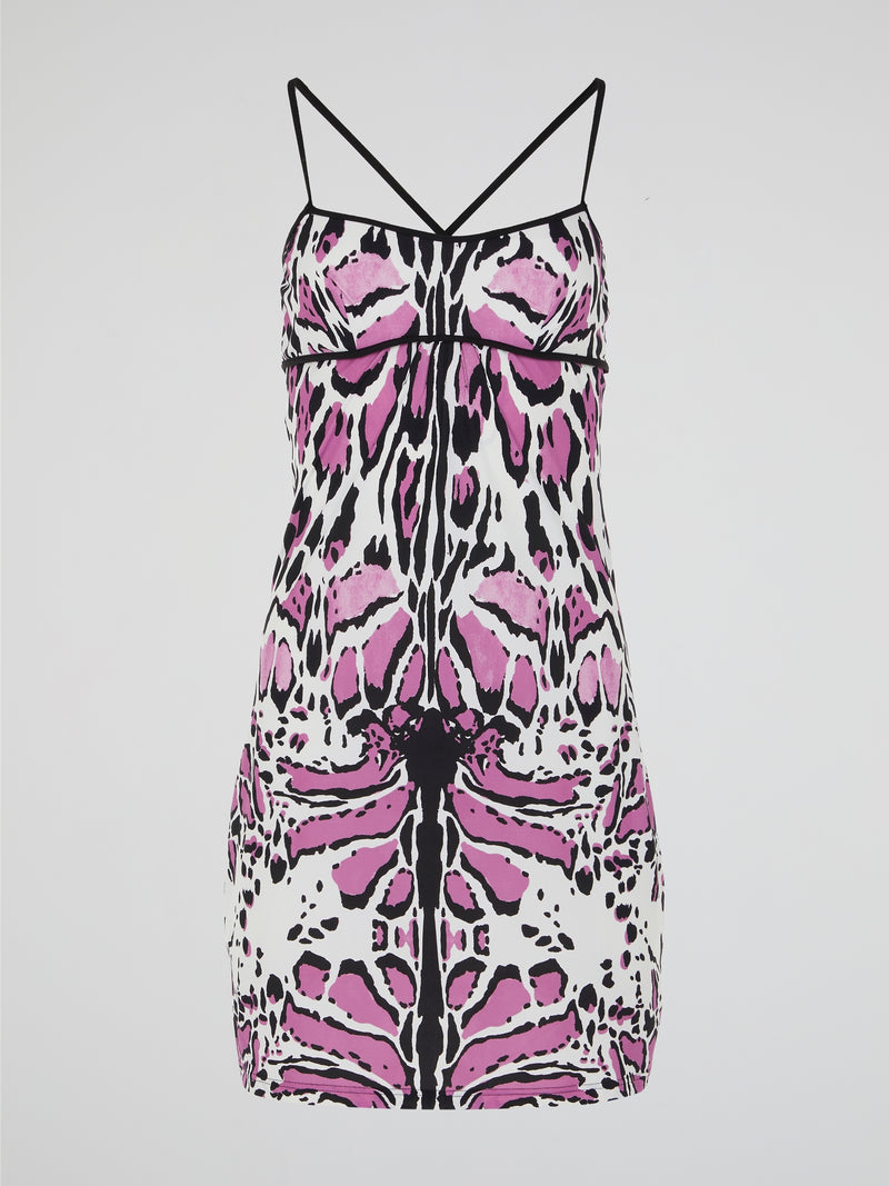 Unleash your wild side with the Animal Print Strap Dress by Roberto Cavalli. This captivating and daring dress features a mesmerizing print that evokes the untamed spirit of the jungle. The sleek and flattering silhouette, coupled with the luxurious fabric, makes it a fierce and fashionable choice for any occasion.