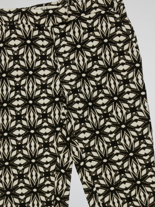 Experience the epitome of sophistication and style with our Jacquard Slim Fit Trousers by Ella Luna. Crafted with meticulous attention to detail, these trousers effortlessly accentuate your silhouette with their sleek, tailored design. The intricate Jacquard pattern weaves an aura of elegance, making these trousers a must-have for any fashion-forward individual looking to make a statement.
