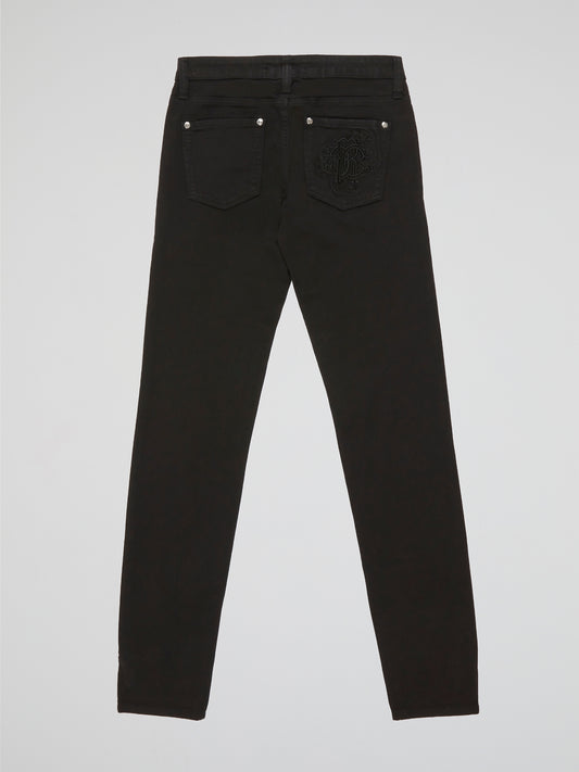 Step into style and unlock a world of sophistication with our Black Straight Fit Jeans by Roberto Cavalli. Crafted from premium quality denim, these jeans seamlessly blend comfort and durability. From casual outings to elegant evening affairs, these jeans effortlessly elevate your fashion game with their sleek, contemporary design.