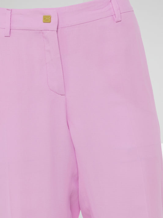 Step into the world of effortlessly chic fashion with Clas Roberto Cavalli's Pink Flared Trousers. These vibrant bottoms combine the perfect blend of style and comfort, ensuring you stand out from the crowd wherever you go. Whether paired with a tailored blazer or a casual crop top, these trousers are the ultimate symbol of confidence and femininity.