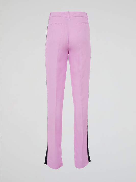 Step into the world of effortlessly chic fashion with Clas Roberto Cavalli's Pink Flared Trousers. These vibrant bottoms combine the perfect blend of style and comfort, ensuring you stand out from the crowd wherever you go. Whether paired with a tailored blazer or a casual crop top, these trousers are the ultimate symbol of confidence and femininity.