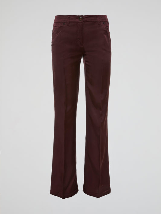 Step up your fashion game with these Burgundy Flared Pants by Clas Roberto Cavalli. Crafted from luxurious materials, these pants offer a sleek and chic silhouette with a touch of retro flair. Perfect for both formal and casual occasions, they effortlessly elevate any outfit, making you the style icon wherever you go.