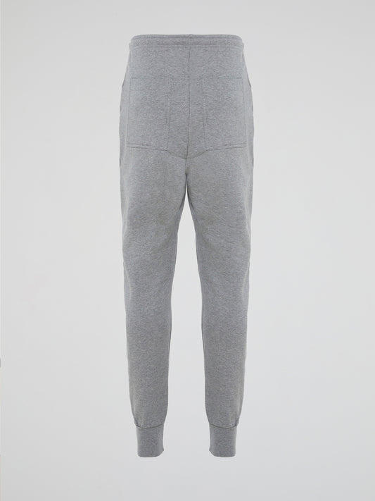 Introducing the Grey Zipper Detailed Sweatpants designed by the visionary fashion guru Markus Lupfer. These sweatpants are the epitome of comfort with a luxurious twist. With their unique zipper detailing, they effortlessly merge style and functionality, making them the ideal companion for both lounging at home and making a bold fashion statement on the streets.
