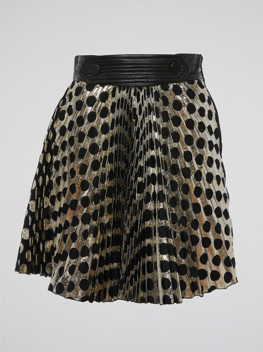 Turn up the charm with the Emanuel Ungaro Foil Polka Dot Pleated Skirt! Designed to make heads turn, this playful skirt features shimmering foil polka dots that bring a touch of whimsy to any outfit. Its flattering pleated design adds movement and dimension, while the high-quality craftsmanship ensures a luxurious feel that will make you the center of attention wherever you go.