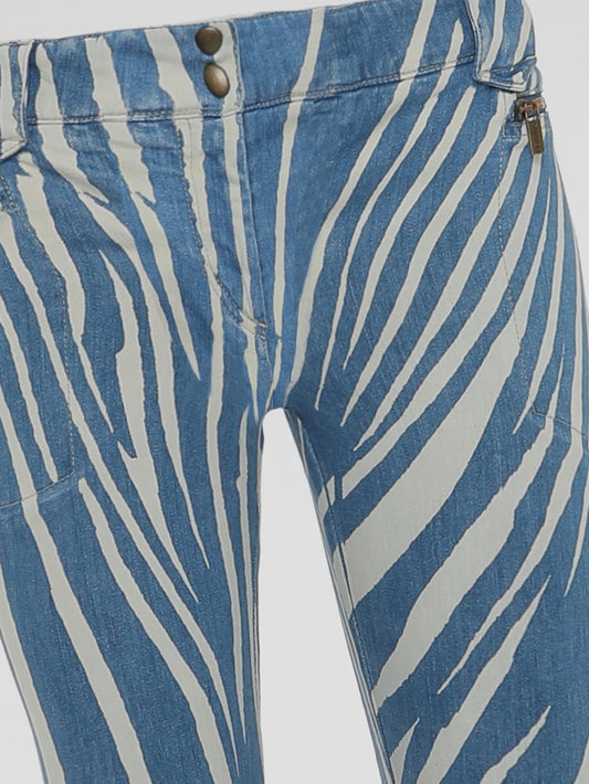 Unleash your inner wild child with our Roberto Cavalli Zebra Print Skinny Jeans. Made from high-quality denim, these jeans embrace the perfect combination of fierce and fashionable. Stand out from the crowd and embrace your unique style with these eye-catching and adventurous bottoms.