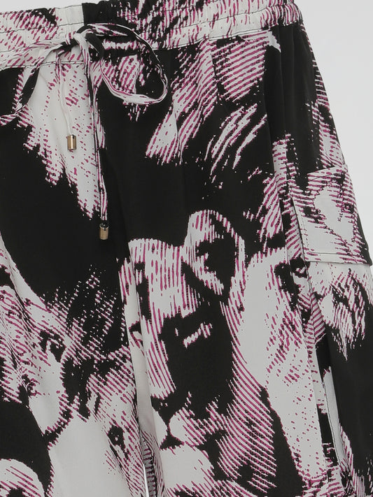 Get ready to unleash your wild side with these Animal Print Drawstring Shorts by Roberto Cavalli. Perfect for the fashion-forward adventurer, these shorts feature a striking animal print pattern that will make you stand out from the crowd. Crafted from high-quality materials, they offer both comfort and style, making them a must-have for any daring fashionista.