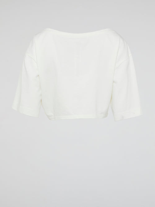Introducing the White Crop Top by Roberto Cavalli, where elegance meets modern femininity. Crafted with luxurious fabrics and meticulous attention to detail, this wardrobe staple exudes effortless sophistication. From casual brunches to glamorous evenings, this versatile piece is guaranteed to turn heads and make a bold fashion statement.