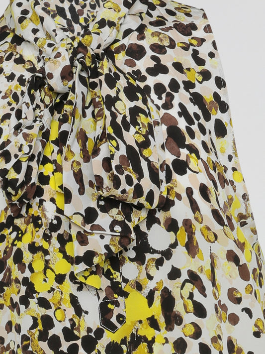 Step into the wild side of fashion with our Yellow Leopard Print Sleeveless Dress by Roberto Cavalli. Embrace the untamed allure of the jungle as you flaunt this fierce and bold design. Drape yourself in confidence and make a striking statement wherever you go, ready to conquer the concrete jungle with unparalleled style.