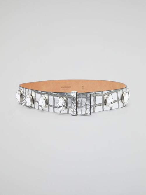 Be prepared to turn heads with the stunning Crystal Embellished Leather Belt by Roberto Cavalli. Crafted from luxurious leather, this belt features sparkling crystals that add a touch of glamour to any outfit. Elevate your style and make a statement with this eye-catching accessory that is sure to make you stand out in a crowd.