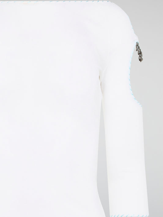 Elevate your everyday wardrobe with this stunning White Cut Out Top from Roberto Cavalli. Crafted from luxurious, high-quality materials, this top features intricate cut out detailing that adds a touch of edge and sophistication to any outfit. Perfect for day or night, this versatile piece is a must-have addition to your fashion collection.