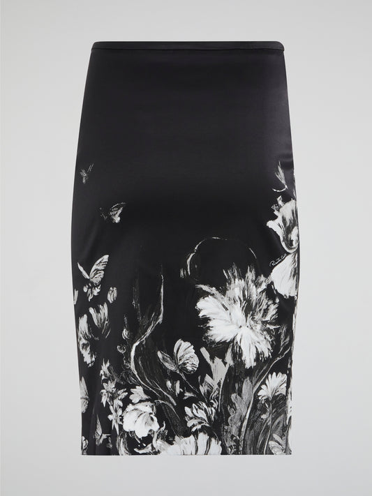 Step into the world of floral elegance with our Flora Print Pencil Skirt by Roberto Cavalli. This stunning piece features a vibrant and intricate floral design that will instantly elevate your outfit. Made with luxurious materials and impeccable tailoring, this pencil skirt is a must-have for any fashion-forward wardrobe.