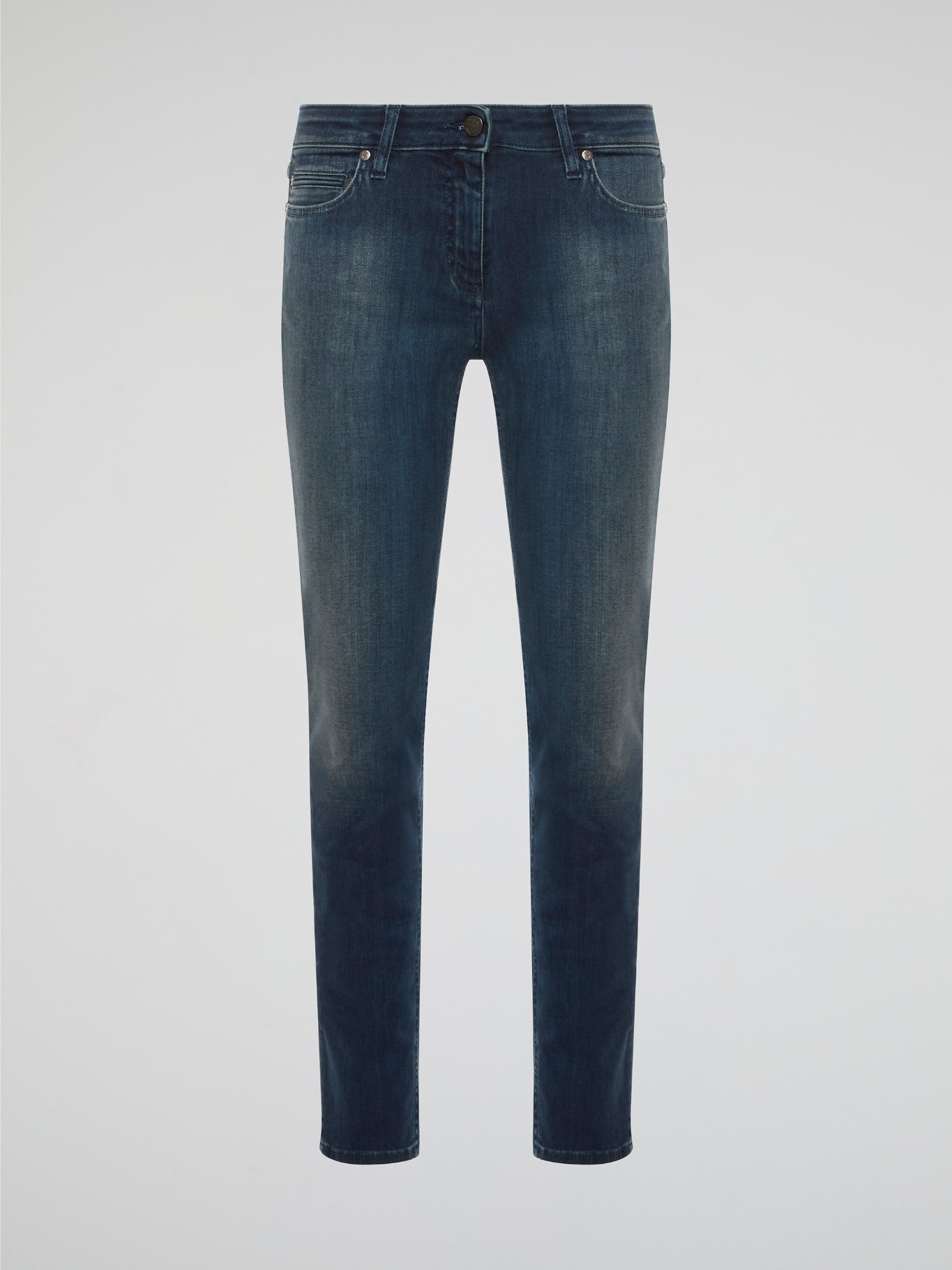 Elevate your denim game with these Stone Washed Skinny Denim Jeans by Roberto Cavalli, designed to hug your curves in all the right places. The unique stone wash finish gives these jeans a worn-in, vintage look that sets them apart from your average pair of skinny jeans. Pair them with a sleek blouse and heels for a chic and edgy urban look that will turn heads wherever you go.