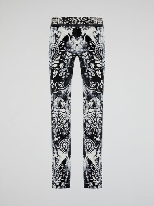 Elevate your wardrobe with our Roberto Cavalli Printed Skinny Trousers, designed to make a bold fashion statement. Crafted from luxurious fabrics and featuring a vibrant print, these trousers are the perfect combination of style and comfort. Whether you're heading to the office or a night out on the town, these trousers will ensure all eyes are on you.