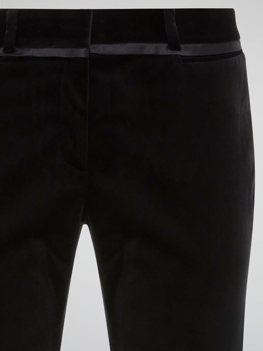Step out in style with these sleek and sophisticated Black Skinny Trousers by Roberto Cavalli. Crafted from luxurious, high-quality fabric, these trousers hug your curves in all the right places for a flattering fit. Whether you're heading to a board meeting or a night out on the town, these trousers will elevate any outfit with a touch of Italian glamour.