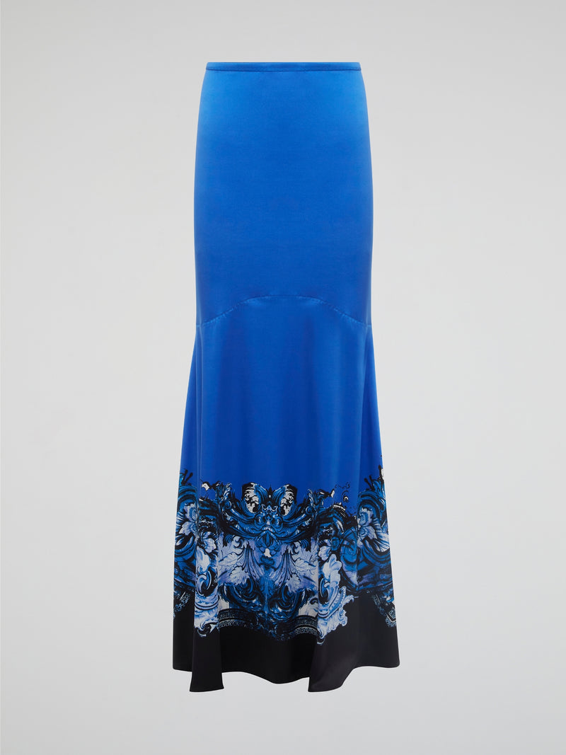 Dive into the depths of fashion with the stunning Blue Floral Mermaid Skirt by Roberto Cavalli. This enchanting piece features a mesmerizing mermaid silhouette that will have you feeling like a mythical sea goddess wherever you go. Adorned with intricate blue floral details, this skirt is sure to make a statement at any event or occasion. Unleash your inner siren and make a splash with this one-of-a-kind piece from Roberto Cavalli.