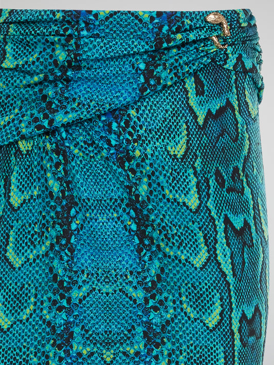 Feel like a fierce fashionista in this stunning Snake Print Maxi Skirt by Roberto Cavalli. With its bold and eye-catching print, this skirt is guaranteed to turn heads wherever you go. Perfect for day or night, this skirt will elevate any outfit and make you feel like a runway star.