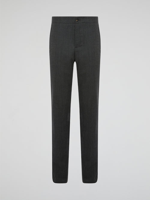 Elevate your everyday wardrobe with these sleek Grey Slim Fit Trousers by Roberto Cavalli, designed for the modern man who values style and sophistication. Made from high-quality fabric with a tailored fit, these trousers effortlessly blend comfort and luxury. Whether you're heading to the office or a night out on the town, these trousers will ensure you look polished and on-trend.