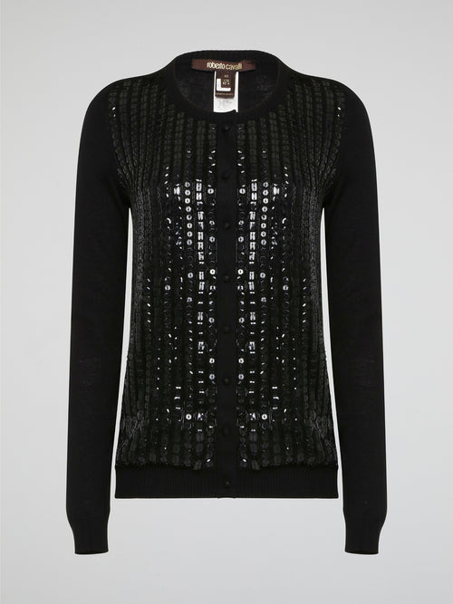 Wrap yourself in luxurious style with this Black Embroidered Cardigan from Roberto Cavalli. Featuring intricate embossed detailing that adds a touch of glamour to any outfit, this cardigan is perfect for layering in the cooler months. Elevate your wardrobe with this statement piece that is sure to turn heads wherever you go.