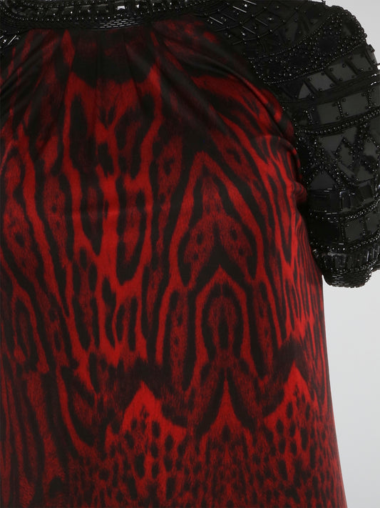 Make a fierce and bold statement with the Roberto Cavalli Leopard Print Embroidered Sleeve Dress. This stunning dress features intricate embroidery detailing on the sleeves, adding a touch of elegance to the edgy leopard print design. Stand out from the crowd and unleash your inner wild side with this show-stopping piece from Roberto Cavalli.