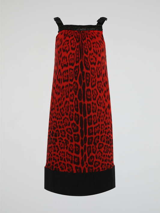 Step into the wild side with this fierce Red Leopard Print Shift Dress by Roberto Cavalli. Crafted from luxurious fabric, this dress is a statement piece perfect for any glamorous occasion. Embrace your inner fashionista and unleash your bold, confident style with this striking and stunning design.