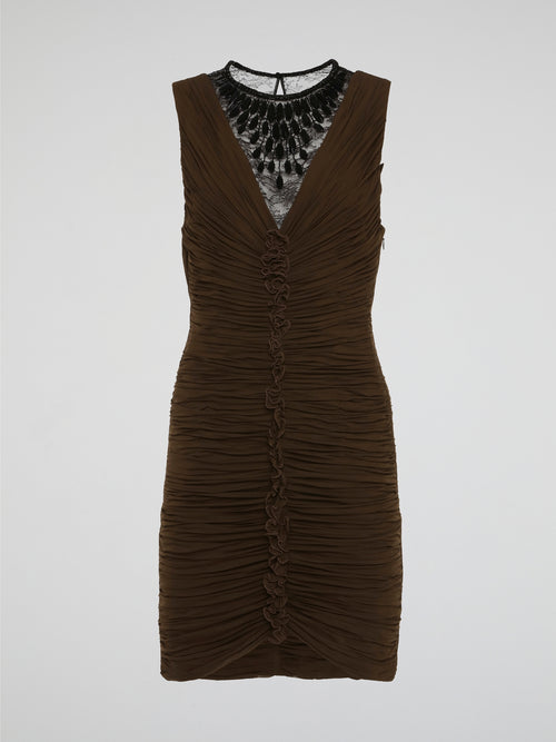 Elevate your evening attire with the sophisticated elegance of the Brown Lace Neckline Ruched Dress by Roberto Cavalli. The intricate lace neckline adds a touch of femininity, while the ruched detailing creates a flattering silhouette. Perfect for any special occasion, this dress exudes luxury and timeless style.