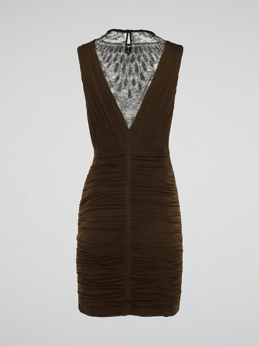 Elevate your evening attire with the sophisticated elegance of the Brown Lace Neckline Ruched Dress by Roberto Cavalli. The intricate lace neckline adds a touch of femininity, while the ruched detailing creates a flattering silhouette. Perfect for any special occasion, this dress exudes luxury and timeless style.