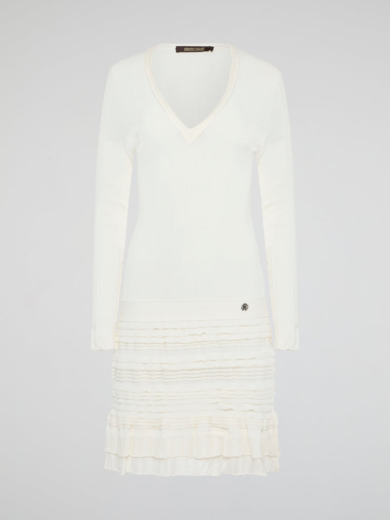 Elevate your winter wardrobe with the luxurious White Knitted Sweater Dress by Roberto Cavalli. This chic and sophisticated piece features intricate knit detailing and a flattering silhouette that will turn heads wherever you go. Whether you're dressing it up with heels for a night out or styling it casually with boots, this sweater dress is sure to make a statement.