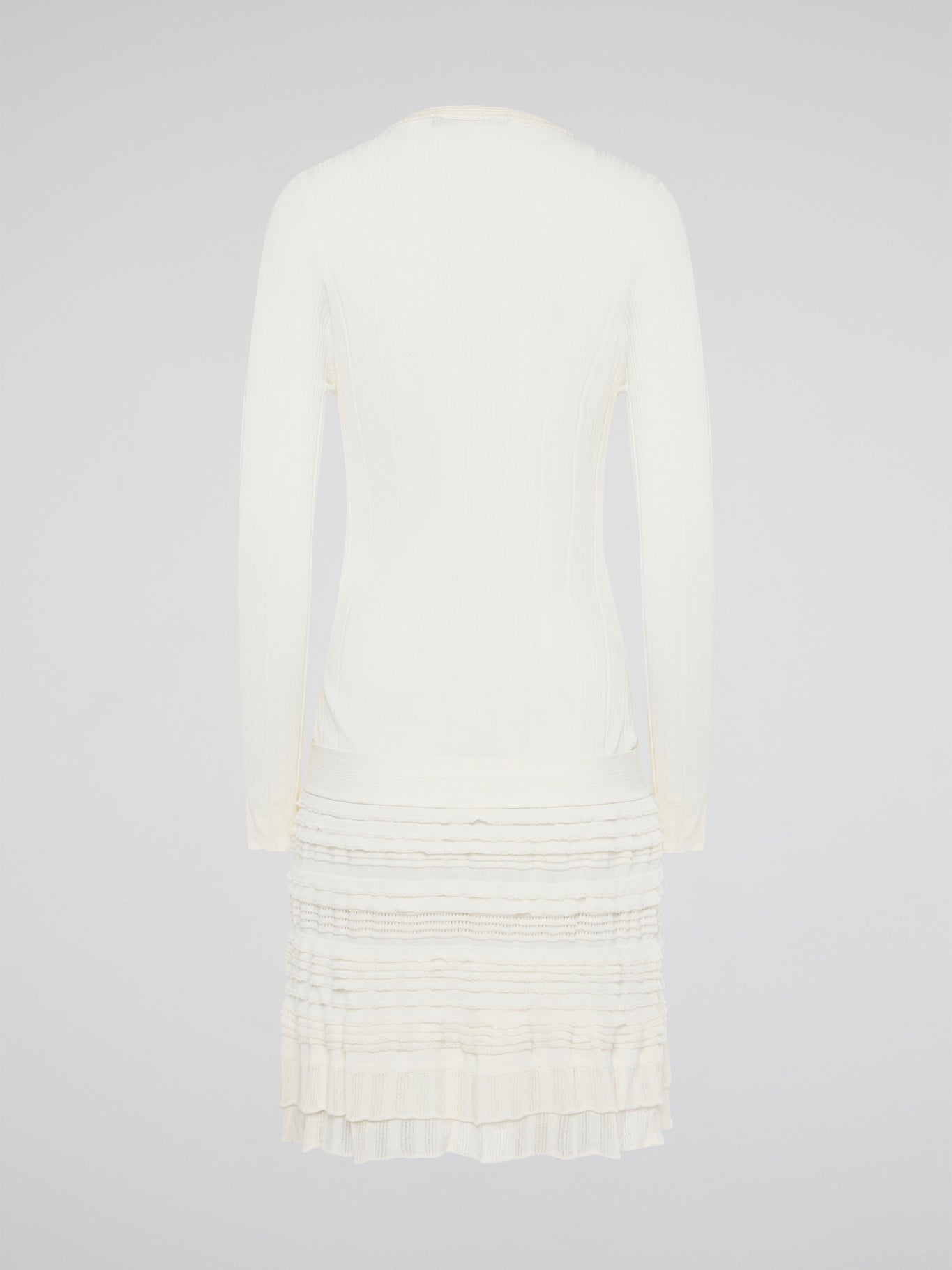 Elevate your winter wardrobe with the luxurious White Knitted Sweater Dress by Roberto Cavalli. This chic and sophisticated piece features intricate knit detailing and a flattering silhouette that will turn heads wherever you go. Whether you're dressing it up with heels for a night out or styling it casually with boots, this sweater dress is sure to make a statement.