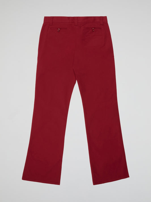 Turn heads in these vibrant Red Palazzo Pants from Moschino Cheap And Chic, the perfect statement piece for your wardrobe. Made with high-quality fabric and featuring a flattering wide-leg silhouette, these pants are both comfortable and stylish. Pair them with a simple top and heels for a chic and sophisticated look that's sure to make you stand out.