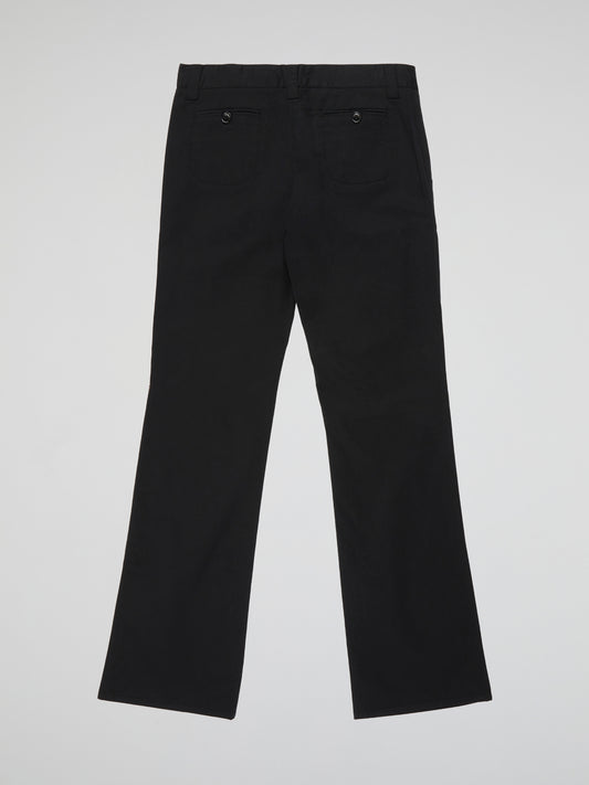 Step out in style and sophistication with these sleek Black Palazzo Pants from Moschino Cheap And Chic. The flowing silhouette and high waist design create an effortlessly chic look that is perfect for any occasion. Elevate your wardrobe with these versatile and trendy pants that will instantly become a staple in your collection.
