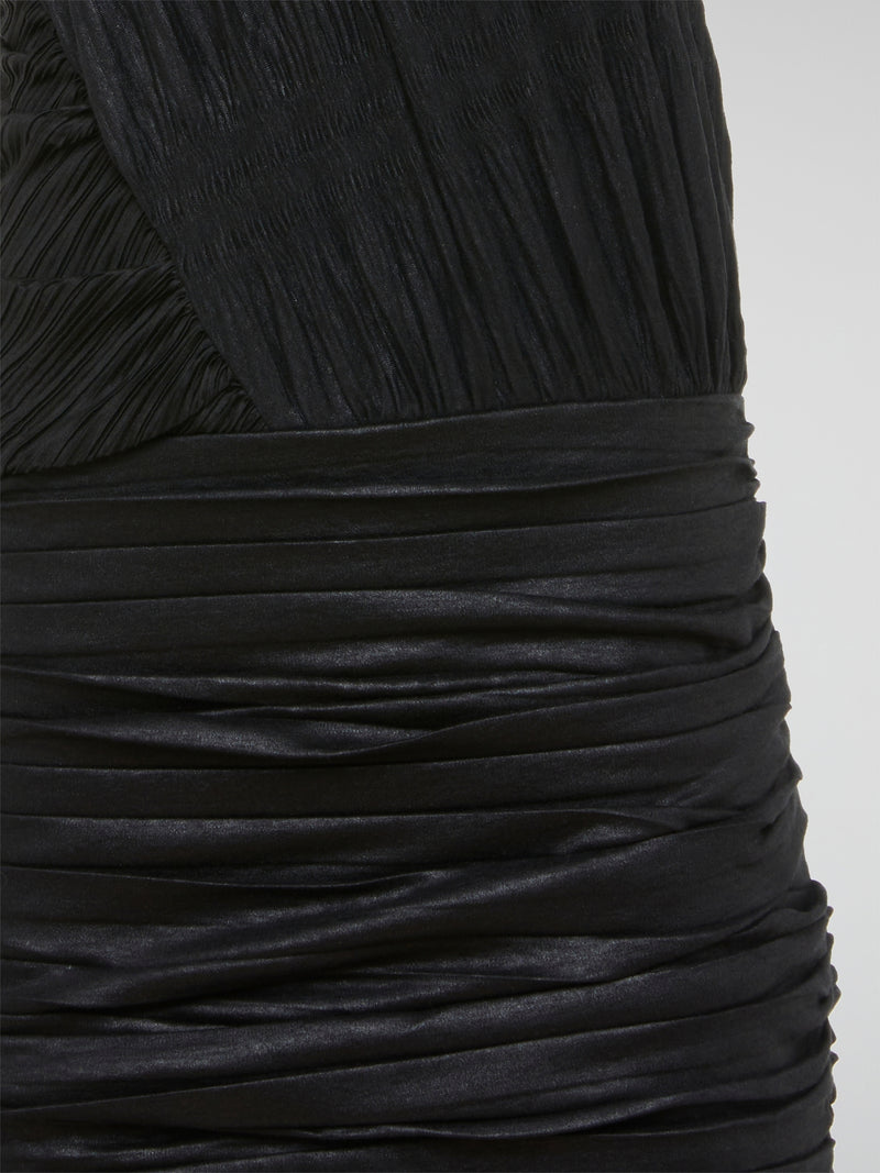 Step up your style game with the Black Asymmetrical Dress by Jay Ahr, a modern twist on the classic little black dress. Featuring a sleek asymmetrical design and daring cutouts, this statement piece is sure to turn heads wherever you go. Embrace your inner fashionista and make a bold impression with this edgy and chic dress.