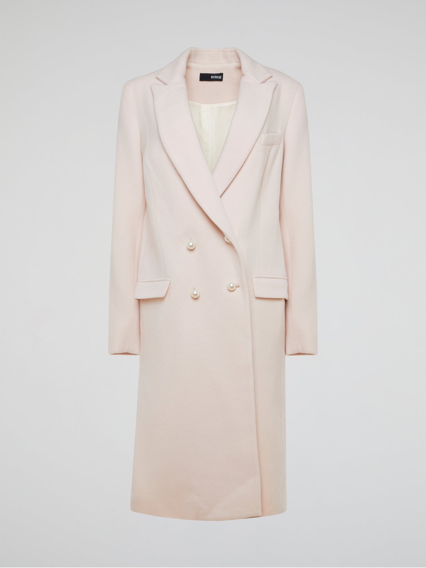 Step out in style with the Powder Pink Trench Coat Nicholas, a chic and sophisticated piece that will elevate any outfit. Its flattering fit and soft pastel hue make it the perfect statement piece for any fashion-forward individual. Be prepared for compliments wherever you go with this stunning wardrobe staple.