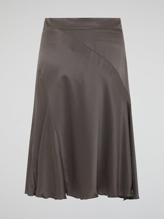 Indulge in effortless sophistication with our alluring Taupe Godet Midi Skirt from Blumarine. Crafted with exquisite detail and a mesmerizing godet design, this skirt is perfect for adding a touch of elegance to any outfit. Elevate your style and turn heads wherever you go with this luxurious and unique piece.