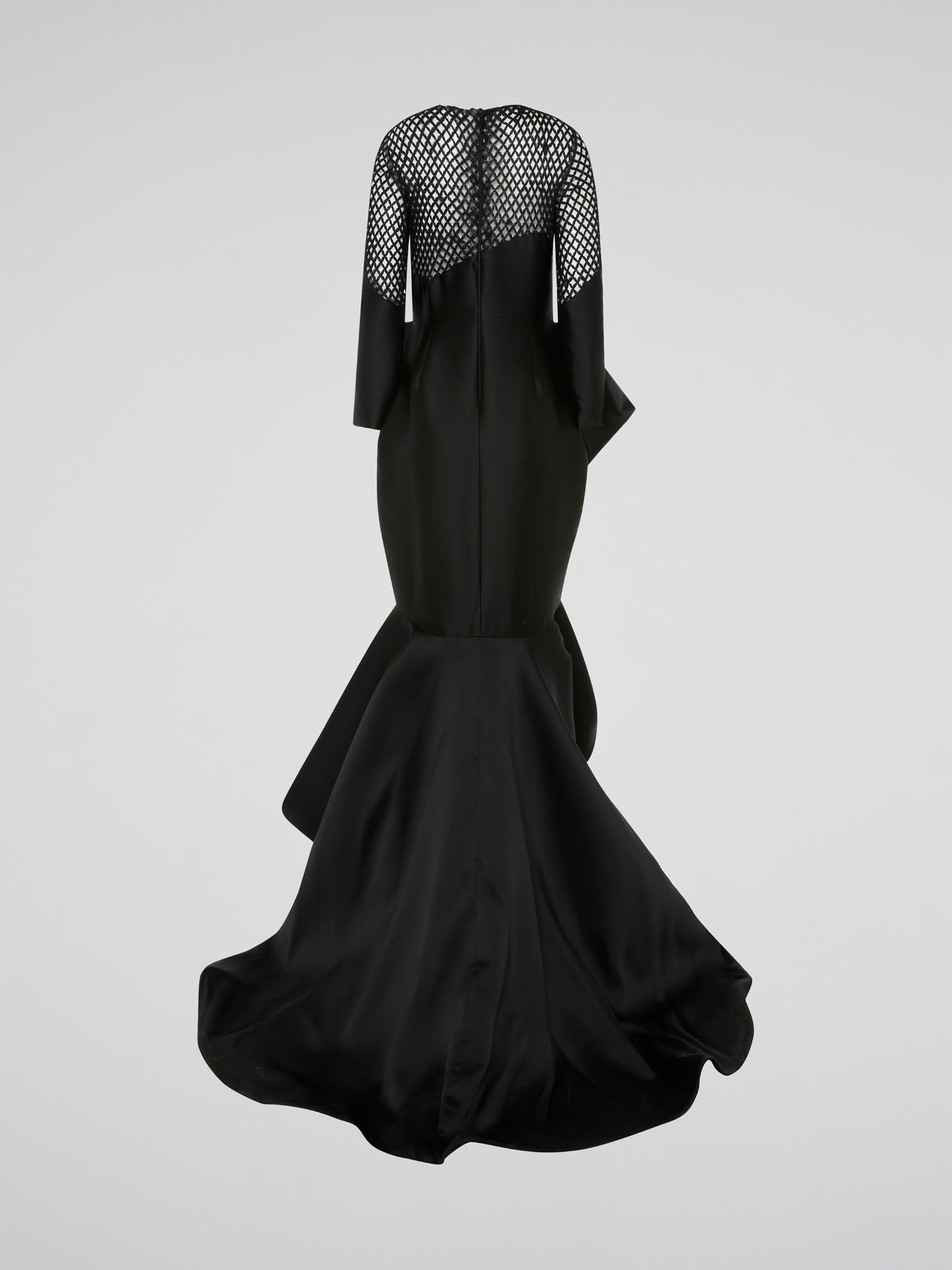 Make a statement in this stunning Black Mesh Bodice Mermaid Gown by Isabel Sanchis. The intricate mesh detailing on the bodice adds a touch of elegance, while the mermaid silhouette hugs your curves in all the right places. Perfect for a formal event or a red carpet soirée, this gown is sure to turn heads and make you feel like a true Hollywood star.