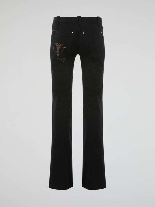 Step out in style with our Black Studded Straight Leg JeansLt By Voyage, featuring edgy studded detailing that will add a touch of rockstar glamour to any outfit. These jeans are made with a comfortable design and a flattering straight leg fit, making them perfect for both casual and dressed-up looks. Elevate your wardrobe with these unique, statement-making jeans that are sure to turn heads wherever you go.