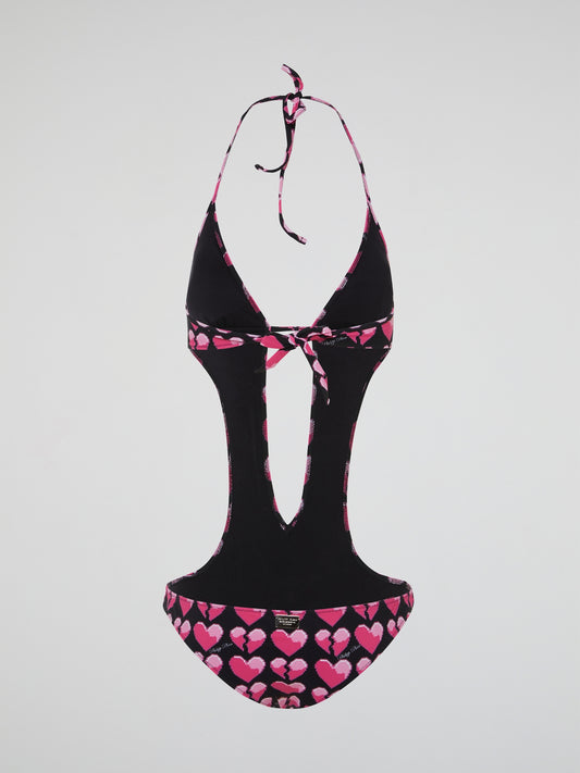 Dive into style with our Heart Print One-Piece Swimsuit by Philipp Plein, a perfect combination of chic and playful. Crafted with high-quality materials and a flattering silhouette, this swimsuit will be sure to turn heads at the beach or pool. Embrace your inner fashionista and make a statement with this must-have summer essential.