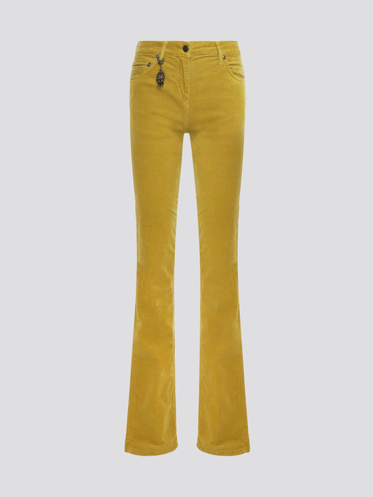 Step out in style and make a statement with these Mustard Flared Jeans by Roberto Cavalli, the perfect blend of high-fashion and retro flair. The mustard color adds a pop of personality to your wardrobe, while the flared leg design elongates your silhouette for a flattering fit. Elevate your denim game and stand out from the crowd with these must-have jeans from Roberto Cavalli.