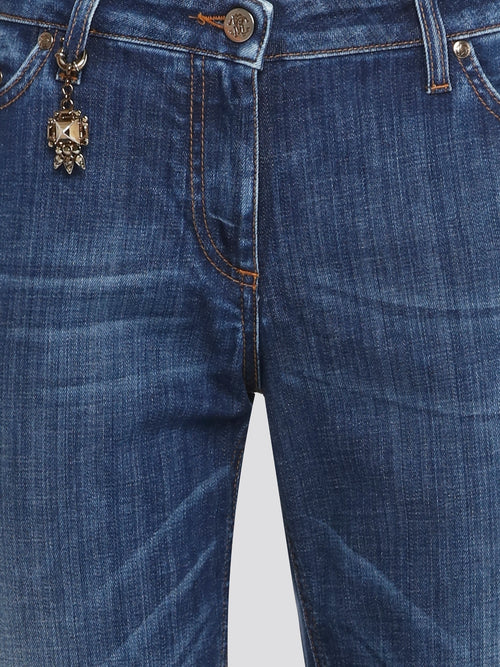 Step out in style with these Blue Stonewashed Skinny Jeans by Roberto Cavalli, perfect for embracing a laid-back yet sophisticated vibe. The unique stonewashed effect gives these jeans a worn-in look that exudes effortless cool. Pair them with a graphic tee and sneakers for an edgy, street-style inspired ensemble.