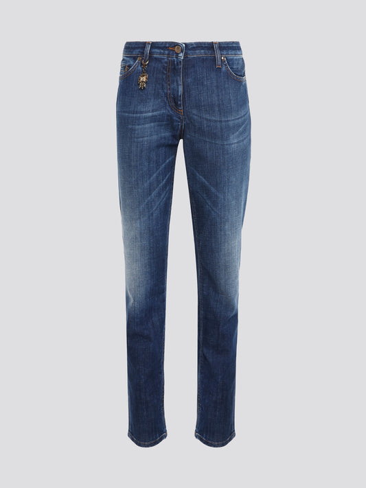 Step out in style with these Blue Stonewashed Skinny Jeans by Roberto Cavalli, perfect for embracing a laid-back yet sophisticated vibe. The unique stonewashed effect gives these jeans a worn-in look that exudes effortless cool. Pair them with a graphic tee and sneakers for an edgy, street-style inspired ensemble.