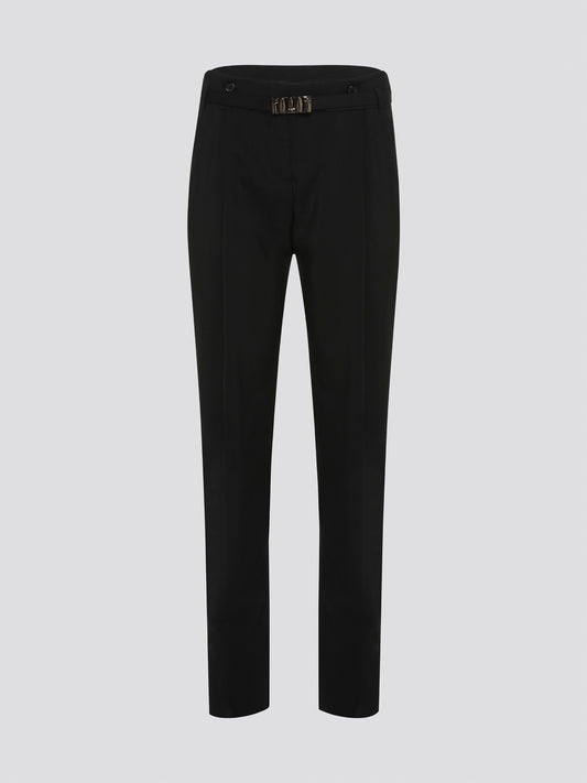 Step up your style game with these chic Black Belted Pleated Trousers by Roberto Cavalli, designed to make a statement. The flattering pleats and elegant belt detailing give these trousers a sophisticated edge, perfect for any fashion-forward individual. Whether worn to the office or a night out on the town, these trousers are sure to turn heads and leave a lasting impression.