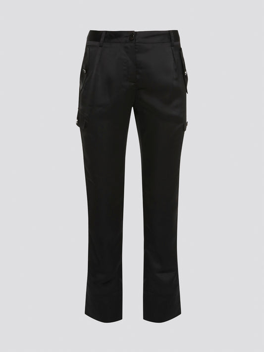 Elevate your everyday look with these sleek and stylish Black Cargo Pants from Roberto Cavalli. Made with premium quality materials, these pants are not only comfortable but also durable for long-lasting wear. With their trendy cargo pockets and tapered fit, they are the perfect statement piece for any fashion-forward individual.