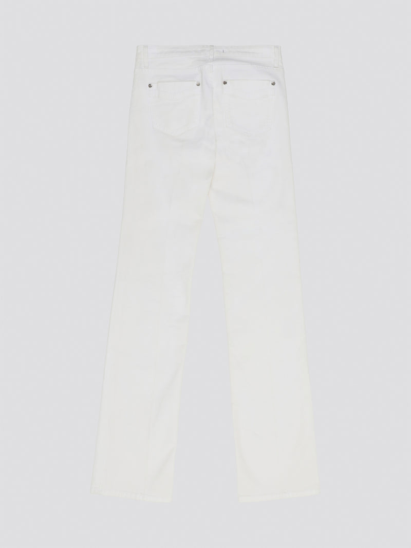 Elevate your denim game with these stunning White Wide Leg Denim Jeans from Roberto Cavalli. Crafted from premium quality denim, these jeans feature a sophisticated wide leg silhouette that exudes elegance and style. Perfect for day or night, these jeans are a versatile must-have addition to your wardrobe.